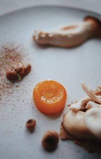 High angle view of orange fruits on table