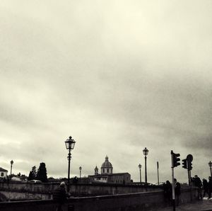 Low angle view of building against cloudy sky