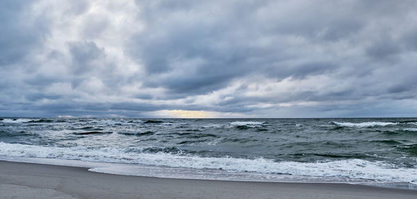 Scenic view of beach against sky