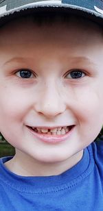 Close-up portrait of smiling boy