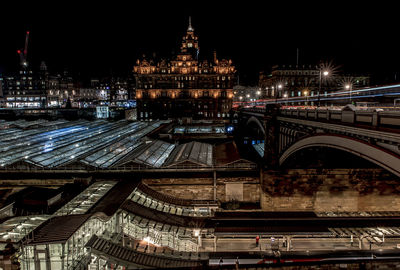 Illuminated waverley station with north bridge at night