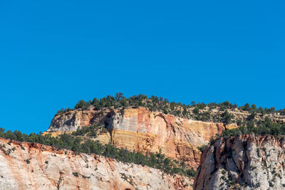 Rock formations against blue sky