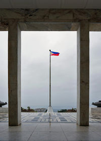 Low angle view of flag against sky