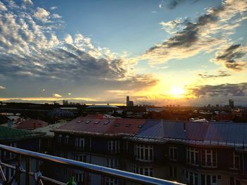 High angle view of townscape against sky at sunset