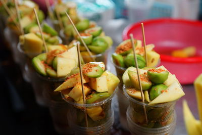 High angle view of fruits in glass on table