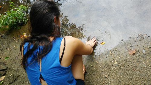 Girl standing in water