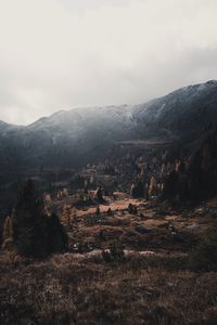 Scenic view of landscape and mountains against sky