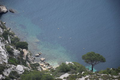 High angle view of rocks and sea