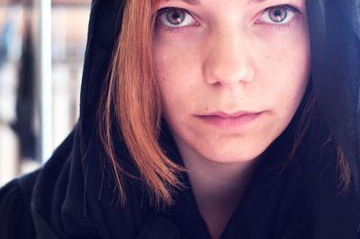 Close-up portrait of woman wearing headscarf