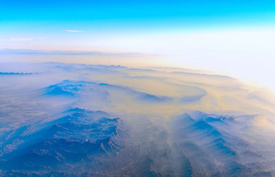 Aerial view of clouds over landscape