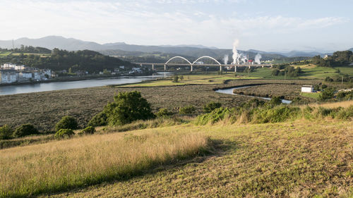 View of bridge over mountain against sky