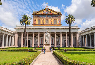 Facade of historic building against sky