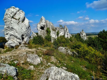 Low angle view of rocks against sky