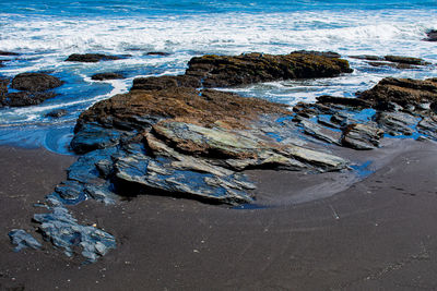 High angle view of rocks on beach