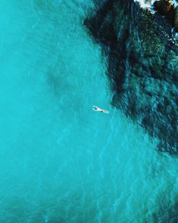 Aerial view of person swimming in sea