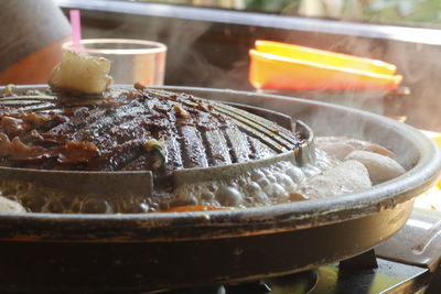 Close-up of meat in container