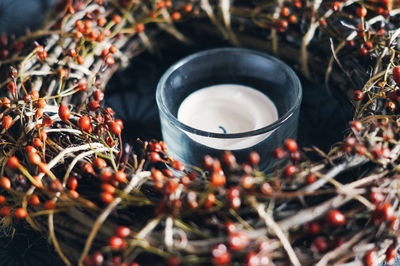 High angle view of candle in nest