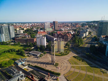 High angle view of buildings against clear sky