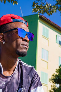 Portrait of young man wearing sunglasses