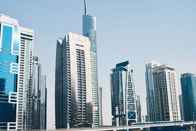 Low angle view of buildings against clear sky