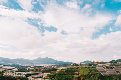 Aerial view of townscape against sky