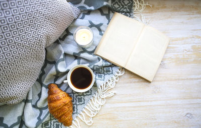 High angle view of coffee cup on table