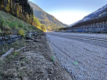 Surface level of road against mountain range