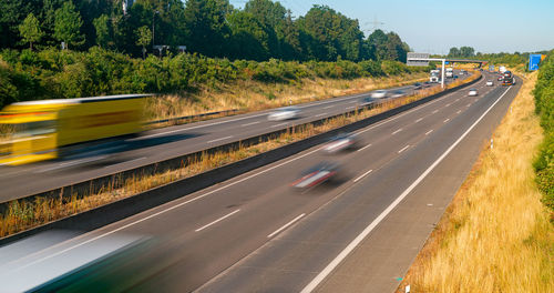 Blurred motion of car on road