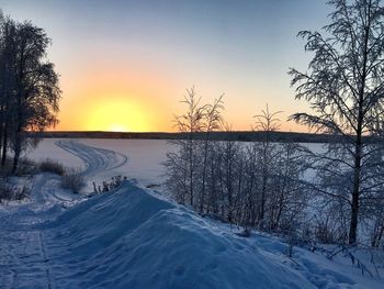 Scenic view of landscape against sky during sunset