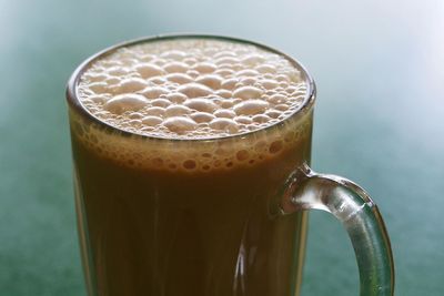 Close-up of coffee cup on table