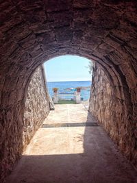 Archway leading towards sea