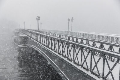 Bridge at snowstorm, skeppsholmen. stockholm, sweden