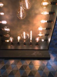 Low angle view of illuminated ceiling