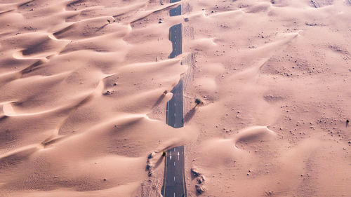 High angle view of sand dunes at beach