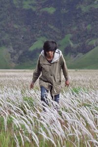 Man walking on field