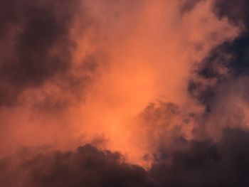 Low angle view of dramatic sky during sunset