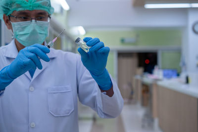 Midsection of person working