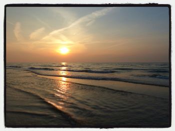 Scenic view of sea at sunset