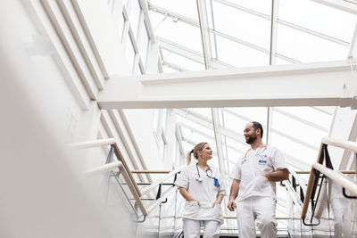 Doctors talking on hospital corridor