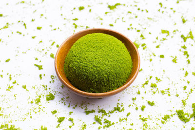 Close-up of green bowl on table