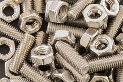 High angle view of nuts and bolts on table