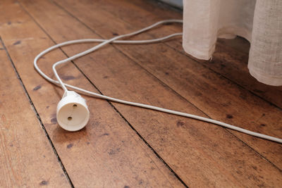 Close-up of in-ear headphones on table