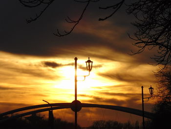 Low angle view of cloudy sky at sunset