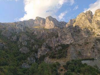 Scenic view of rocky mountains against sky
