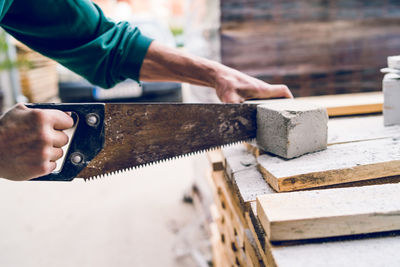 High angle view of man working on wood