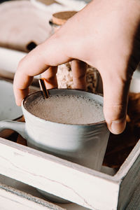 Close-up of person preparing food