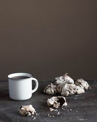 Close-up of coffee cup on table