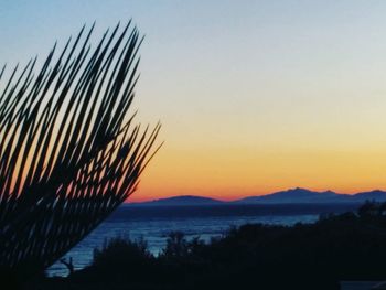 Scenic view of mountains at sunset