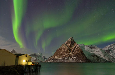 Scenic view of sea against sky at night