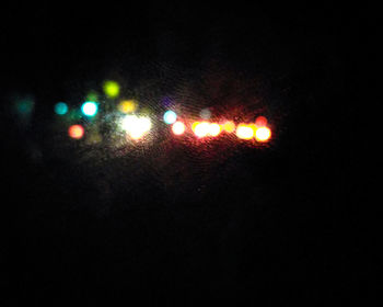 Close-up of illuminated lighting equipment